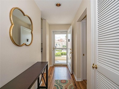 Sweeping golf views from this pied-a-terre in prestigious on Oak Harbor Country Club in Florida - for sale on GolfHomes.com, golf home, golf lot