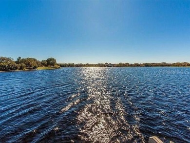 If you are looking for a fully updated, ground floor, lakefront on On Top Of The World Golf Course in Florida - for sale on GolfHomes.com, golf home, golf lot