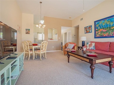 Sweeping golf views from this pied-a-terre in prestigious on Oak Harbor Country Club in Florida - for sale on GolfHomes.com, golf home, golf lot