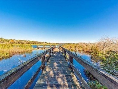 If you are looking for a fully updated, ground floor, lakefront on On Top Of The World Golf Course in Florida - for sale on GolfHomes.com, golf home, golf lot