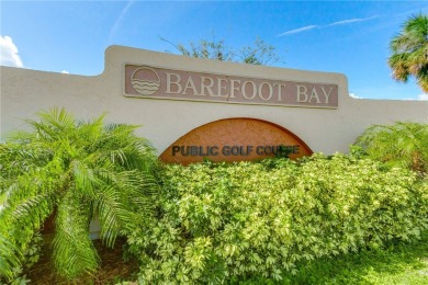 MOTIVATED SELLER! Well maintained, bright and open home in the on Barefoot Bay Golf Course in Florida - for sale on GolfHomes.com, golf home, golf lot