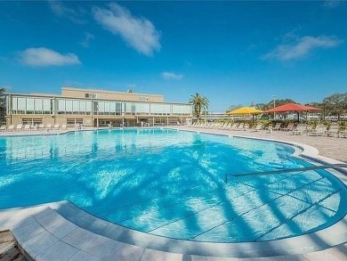 If you are looking for a fully updated, ground floor, lakefront on On Top Of The World Golf Course in Florida - for sale on GolfHomes.com, golf home, golf lot