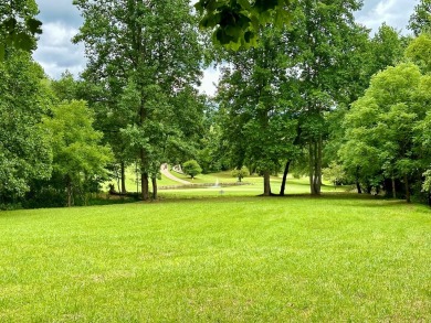 Picturesque 1.29-acre lot overlooks the 12th green, featuring a on Mountain Harbour Golf Club in North Carolina - for sale on GolfHomes.com, golf home, golf lot
