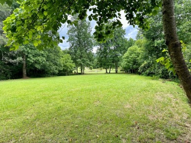 Picturesque 1.29-acre lot overlooks the 12th green, featuring a on Mountain Harbour Golf Club in North Carolina - for sale on GolfHomes.com, golf home, golf lot