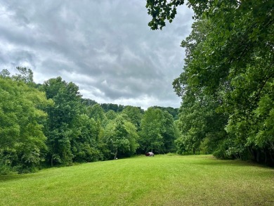 Picturesque 1.29-acre lot overlooks the 12th green, featuring a on Mountain Harbour Golf Club in North Carolina - for sale on GolfHomes.com, golf home, golf lot