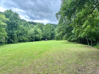 Picturesque 1.29-acre lot overlooks the 12th green, featuring a on Mountain Harbour Golf Club in North Carolina - for sale on GolfHomes.com, golf home, golf lot