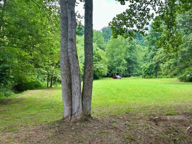 Picturesque 1.29-acre lot overlooks the 12th green, featuring a on Mountain Harbour Golf Club in North Carolina - for sale on GolfHomes.com, golf home, golf lot