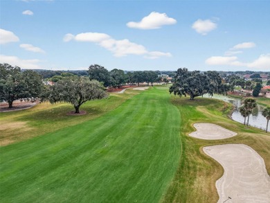EXPERIENCE LUXURY LIVING in this EXQUISITE, GOLF & WATER VIEW on El Diablo Executive Golf Course in Florida - for sale on GolfHomes.com, golf home, golf lot