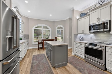 EXPERIENCE LUXURY LIVING in this EXQUISITE, GOLF & WATER VIEW on El Diablo Executive Golf Course in Florida - for sale on GolfHomes.com, golf home, golf lot