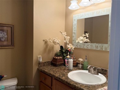 Welcome to this light and bright 2 bedroom, 2.5 bath condo in on Boca Lago Golf and Country Club in Florida - for sale on GolfHomes.com, golf home, golf lot