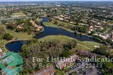 Welcome to this light and bright 2 bedroom, 2.5 bath condo in on Boca Lago Golf and Country Club in Florida - for sale on GolfHomes.com, golf home, golf lot