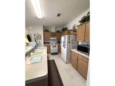 ***This home is located within a 55+ resort style leased land on Big Cypress Golf and Country Club in Florida - for sale on GolfHomes.com, golf home, golf lot