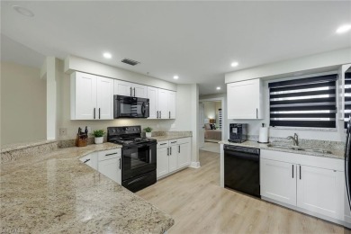 This beautiful three-bedroom, two-bath first-floor home is in on Bonita Bay West in Florida - for sale on GolfHomes.com, golf home, golf lot