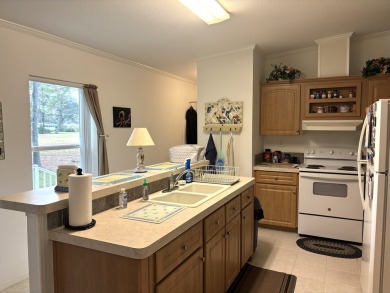 ***This home is located within a 55+ resort style leased land on Big Cypress Golf and Country Club in Florida - for sale on GolfHomes.com, golf home, golf lot