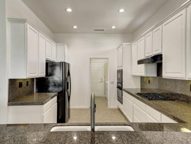 Welcome to this immaculate 2-bedroom, 2-bathroom + den home on Heritage Palms Golf Club in California - for sale on GolfHomes.com, golf home, golf lot