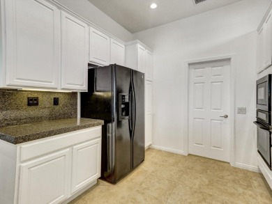 Welcome to this immaculate 2-bedroom, 2-bathroom + den home on Heritage Palms Golf Club in California - for sale on GolfHomes.com, golf home, golf lot