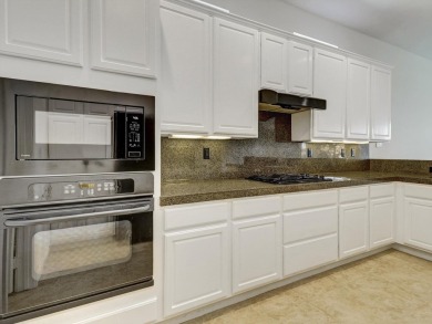 Welcome to this immaculate 2-bedroom, 2-bathroom + den home on Heritage Palms Golf Club in California - for sale on GolfHomes.com, golf home, golf lot