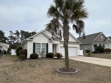 Located in the gated community of Waters Edge, this 3-bedroom on Tidewater Golf Club and Plantation in South Carolina - for sale on GolfHomes.com, golf home, golf lot