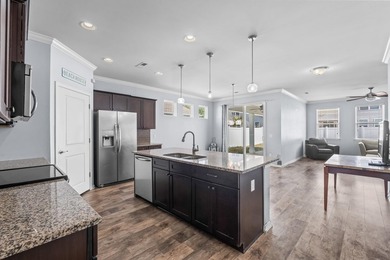 Located in the gated community of Waters Edge, this 3-bedroom on Tidewater Golf Club and Plantation in South Carolina - for sale on GolfHomes.com, golf home, golf lot