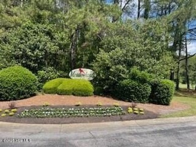 Great lot on a quiet street in the original section of the on Meadowlands Golf Club in North Carolina - for sale on GolfHomes.com, golf home, golf lot