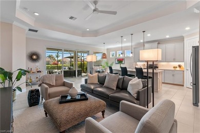 DESIGNER HOME WITH LAKE VIEW, OVERSIZED THREE CAR GARAGE & on Bonita National Golf Course in Florida - for sale on GolfHomes.com, golf home, golf lot