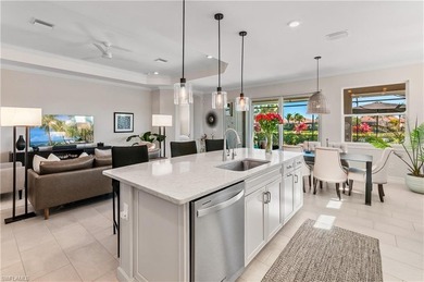 DESIGNER HOME WITH LAKE VIEW, OVERSIZED THREE CAR GARAGE & on Bonita National Golf Course in Florida - for sale on GolfHomes.com, golf home, golf lot