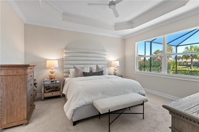 DESIGNER HOME WITH LAKE VIEW, OVERSIZED THREE CAR GARAGE & on Bonita National Golf Course in Florida - for sale on GolfHomes.com, golf home, golf lot