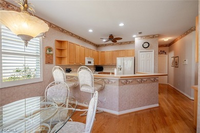 Welcome to this beautifully maintained, one-owner Osprey floor on Herons Glen Golf and Country Club in Florida - for sale on GolfHomes.com, golf home, golf lot