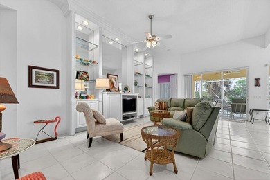 Beautifully maintained 3-bedroom + den, 2.5-bath Oakmont model on Lost Lake Golf Club in Florida - for sale on GolfHomes.com, golf home, golf lot