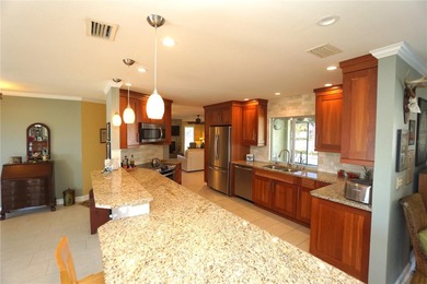 Welcome to Punta Gorda Isles and this 3 bed, 2 bath home with an on Saint Andrews South Golf Club in Florida - for sale on GolfHomes.com, golf home, golf lot