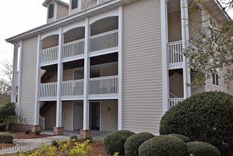 What an opportunity to own this 2 bedroom, 2 bath top floor unit on Members Club At St. James Plantation in North Carolina - for sale on GolfHomes.com, golf home, golf lot