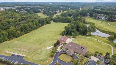 Nestled within the prestigious Verdict Ridge golf community on Verdict Ridge Golf and Country Club in North Carolina - for sale on GolfHomes.com, golf home, golf lot