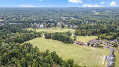 Nestled within the prestigious Verdict Ridge golf community on Verdict Ridge Golf and Country Club in North Carolina - for sale on GolfHomes.com, golf home, golf lot