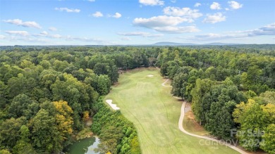 Nestled within the prestigious Verdict Ridge golf community on Verdict Ridge Golf and Country Club in North Carolina - for sale on GolfHomes.com, golf home, golf lot