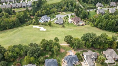 Nestled within the prestigious Verdict Ridge golf community on Verdict Ridge Golf and Country Club in North Carolina - for sale on GolfHomes.com, golf home, golf lot