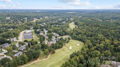 Nestled within the prestigious Verdict Ridge golf community on Verdict Ridge Golf and Country Club in North Carolina - for sale on GolfHomes.com, golf home, golf lot