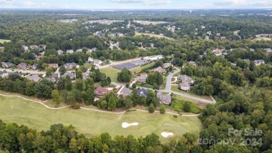 Nestled within the prestigious Verdict Ridge golf community on Verdict Ridge Golf and Country Club in North Carolina - for sale on GolfHomes.com, golf home, golf lot