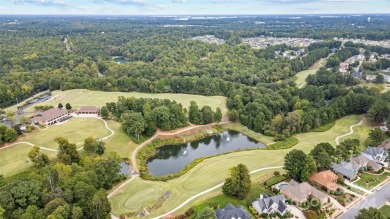 Nestled within the prestigious Verdict Ridge golf community on Verdict Ridge Golf and Country Club in North Carolina - for sale on GolfHomes.com, golf home, golf lot