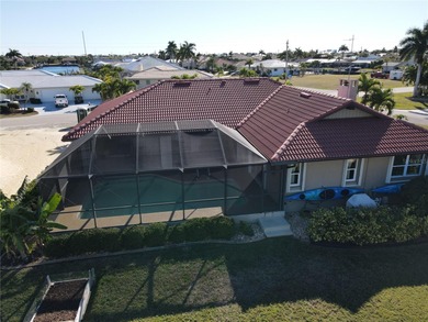 Welcome to Punta Gorda Isles and this 3 bed, 2 bath home with an on Saint Andrews South Golf Club in Florida - for sale on GolfHomes.com, golf home, golf lot