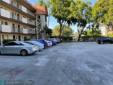This beautifully remodeled condo in a gated community provides on Inverrary Country Club in Florida - for sale on GolfHomes.com, golf home, golf lot