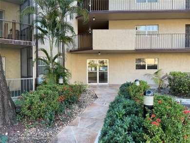 This beautifully remodeled condo in a gated community provides on Inverrary Country Club in Florida - for sale on GolfHomes.com, golf home, golf lot