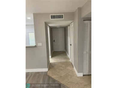This beautifully remodeled condo in a gated community provides on Inverrary Country Club in Florida - for sale on GolfHomes.com, golf home, golf lot