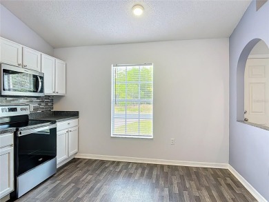 Discover the perfect blend of modern updates and move-in-ready on Citrus Springs Country Club in Florida - for sale on GolfHomes.com, golf home, golf lot