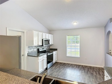 Discover the perfect blend of modern updates and move-in-ready on Citrus Springs Country Club in Florida - for sale on GolfHomes.com, golf home, golf lot