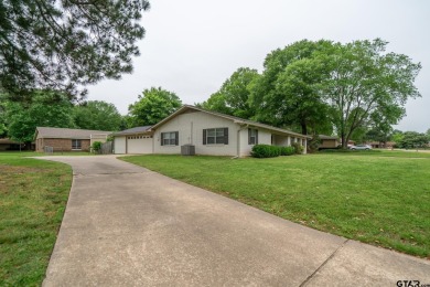 This amazing home is located on a large corner lot in Pittsburg on Princedale Golf Club in Texas - for sale on GolfHomes.com, golf home, golf lot