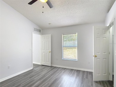 Discover the perfect blend of modern updates and move-in-ready on Citrus Springs Country Club in Florida - for sale on GolfHomes.com, golf home, golf lot