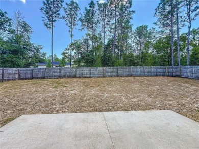 Discover the perfect blend of modern updates and move-in-ready on Citrus Springs Country Club in Florida - for sale on GolfHomes.com, golf home, golf lot