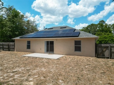 Discover the perfect blend of modern updates and move-in-ready on Citrus Springs Country Club in Florida - for sale on GolfHomes.com, golf home, golf lot