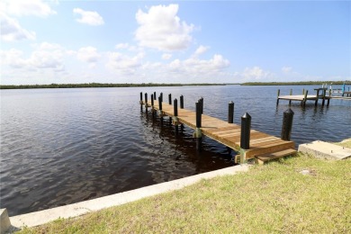 Welcome to your riverfront oasis on the scenic Peace River--a on Deep Creek Golf Club in Florida - for sale on GolfHomes.com, golf home, golf lot