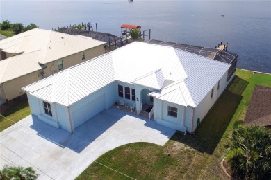 Welcome to your riverfront oasis on the scenic Peace River--a on Deep Creek Golf Club in Florida - for sale on GolfHomes.com, golf home, golf lot